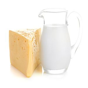 Big piece of cheese, glass jug with milk (Demo)